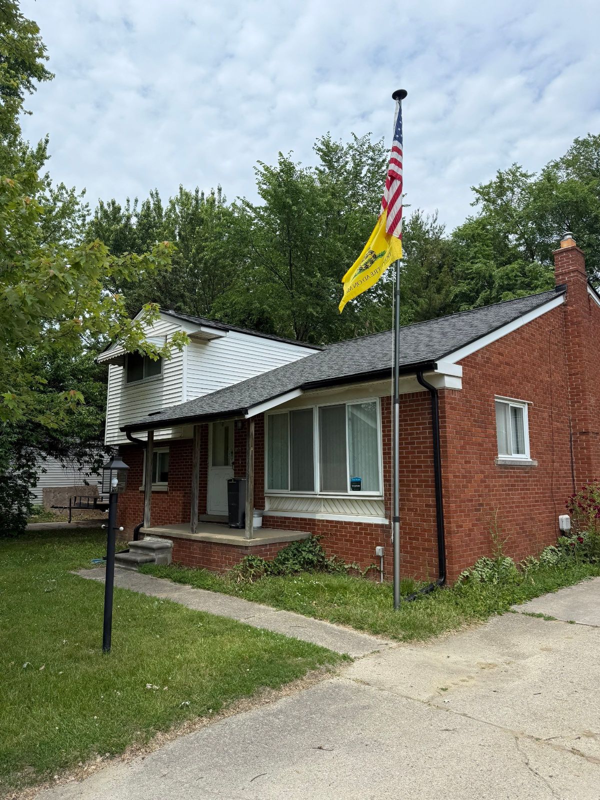 Completed roof replacement on a Metro Detroit home by CCP Contracting